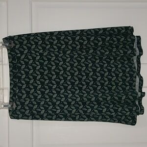 Green and black patterned skirt